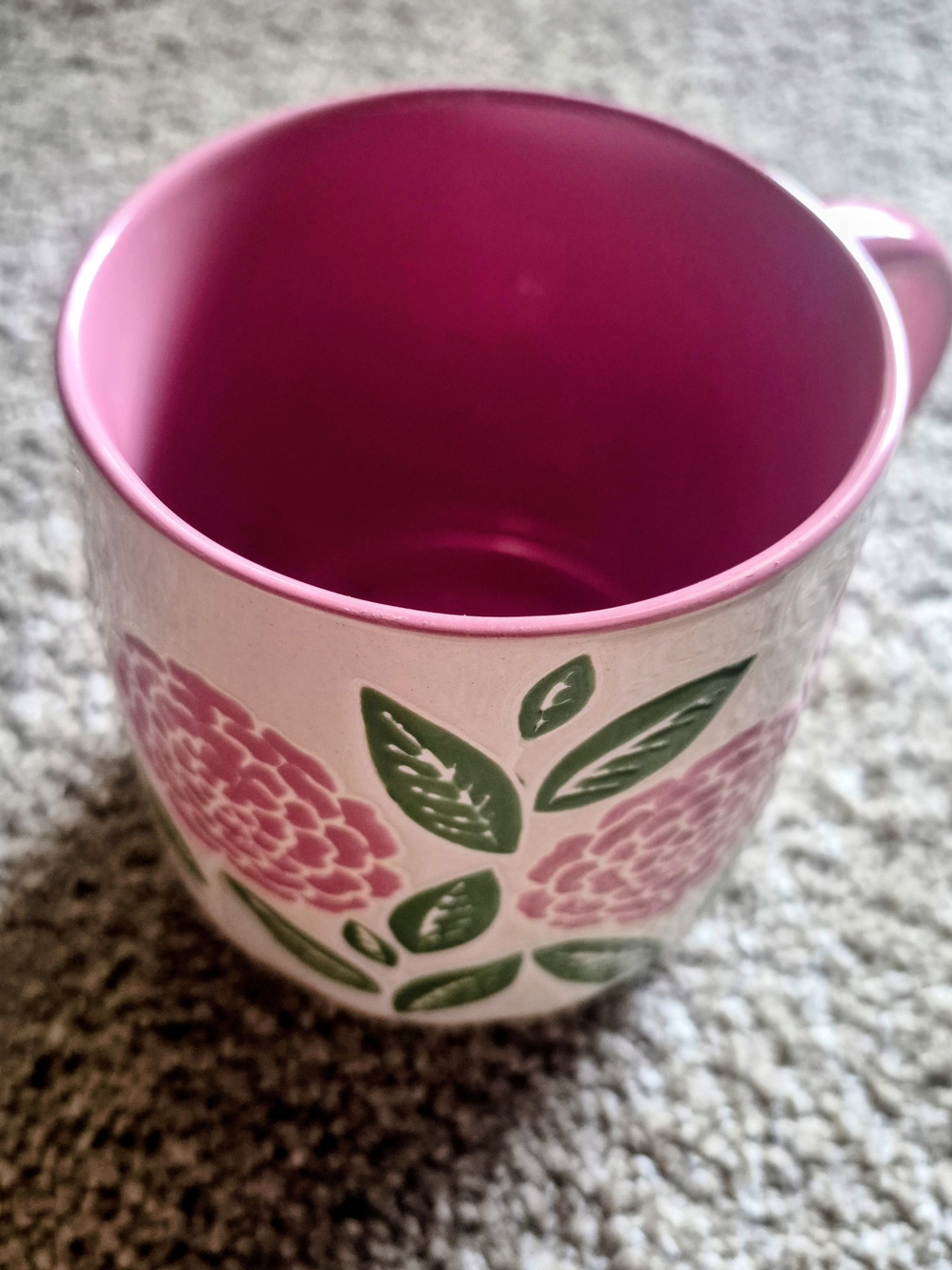 Pink Floral Ceramic Mug with Textured Green Leaf Design